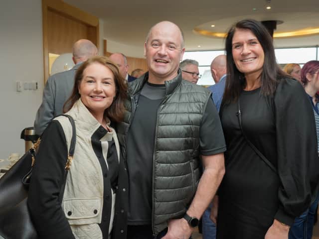 Oonagh and Pearce Kelly with Sarah Halliday from Henderson Wholesale at the celebration event at Cancer Fund for Children, marking £2,000,000 raised by the stores since 2011