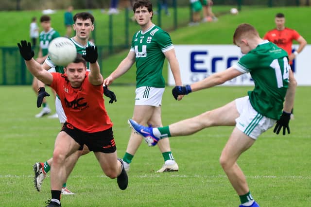 Newbridge’s Dylan McGreevy scores a point with this kick.