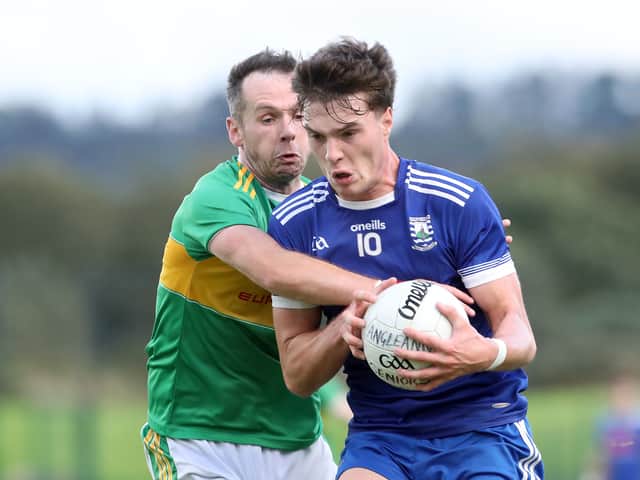 Glen Connor Carville with Charlie Diamond of Bellaghy during Sundays Derry SFC match at Owenbeg.