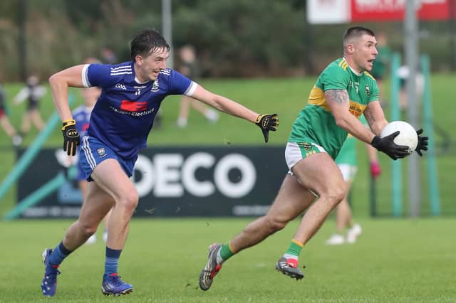 Glen Ciaran McFaul with Paul Cassidy of Bellaghy during Sundays Derry SFC match at Owenbeg.