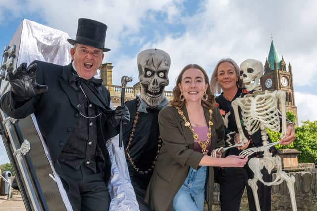 Spooky new song to capture the spirit of Derry Hallowe’en. From left: Martin ‘the Undertaker’ Mullan with Mayor Grace Uí Niallais and Hallowe’en Festival co-ordinator Andrea Campbell, marking the release of ‘The Number One Hallowe’en Song - What’s The Craic?’