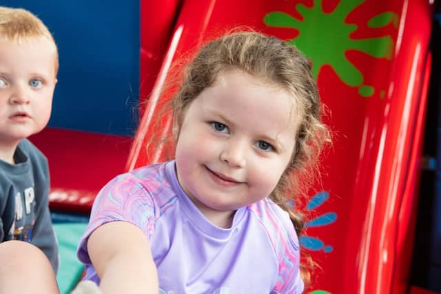 Inclusive play: children enjoyed a range of activities at Bann Valley Community Group’s Inclusion summer scheme, funded by the Housing Executive, including the Belfast Playbus.