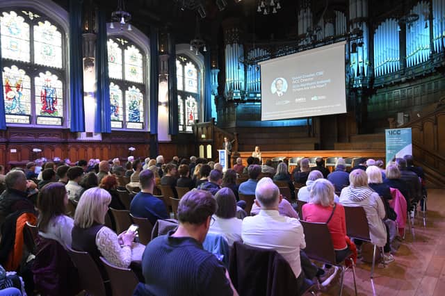 Around 130 members of the public gather at the Guildhall in Derry for the AI and Our Society public forum event with the Artificial Intelligence Collaboration Centre.