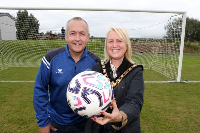 Mayor of Causeway Coast and Glens, Councillor Dawn Huggins with John McMichael, Chairman of Burnfoot FC.