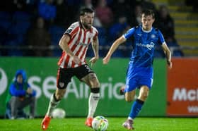 Derry City defender Patrick McClean in action against Waterford's Tommy Lonergan. PHOTO: Eakin Howard/Sportsfile.