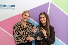 Carly Heggarty, Equality and Wellbeing Manager at Northern Regional College and Shannon Murphy Education Support Co-Ordinator pictured with the Autism NI Award.