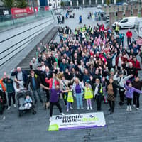 IN PICTURES: Hundreds flood Derry's Peace Bridge for dementia walk