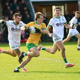 Desertmartin’s Ryan McEldowney makes a break with the ball against Craigbane in the Intermediate Football Championship semi-final at Owenbeg.