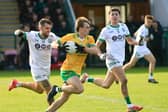Desertmartin’s Ryan McEldowney makes a break with the ball against Craigbane in the Intermediate Football Championship semi-final at Owenbeg.