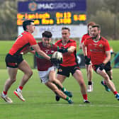 Greenlough players close down Eoghan Rua forward during the McFeely Group Derry IFC semi-final.