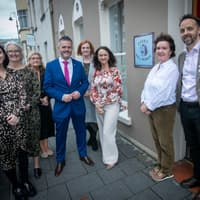 IN PICTURES: Health Minister Robbie Butler welcomed at Derry Well Women