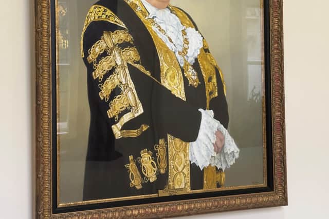 The portrait of former Belfast lord mayor Lord Wallace Browne (Liam McBurney/PA)