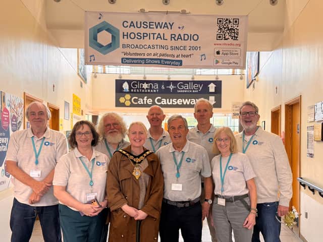 Causeway Hospital Radio volunteers pictured with the Mayor of Causeway Coast and Glens Borough Council, Councillor Dawn Huggins.