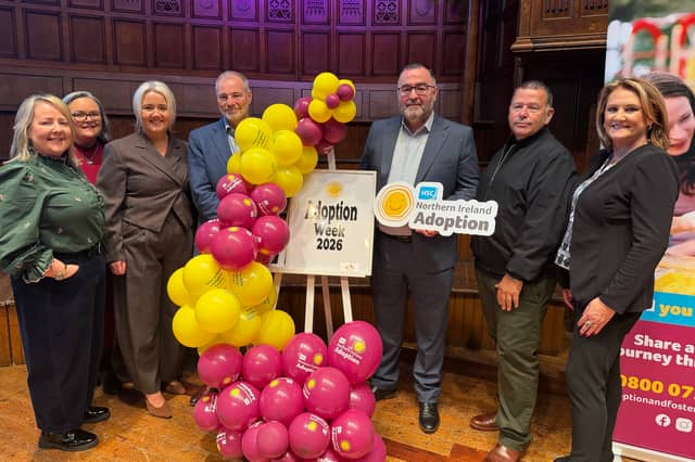 D:Ream star Peter Cunnah (second on right) joins families at the Guildhall to open Adoption Week NI and inspire a new generation of adoptive parents.