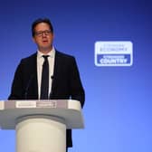 Alex Burghart speaks during the Conservative party conference at Symphony Hall, Birmingham
