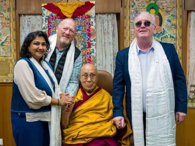 Foreglen's Greg McLaughlin pictured with His Holiness the Dalai Lama and Richard Moore, Children in Crossfire.