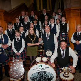 The Mayor of Derry City and Strabane District Council, Grace Ui Niallais pictured at the Guildhall on Tuesday evening making a presentation to the Bready Ulster Scots Pipe Band on being crowned world champioins 2026 in Grade 4B at the World Pipe Band Championships, and for securing the title of World Champion Drum Corps, Grade 4B. 