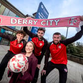 Hannah Rooney, Translink Assistant Route Manager for Northern Area Rail, pictured at the North West Transport Hub with Derry City FC players Nick Twisk, Ellis Chapman and Patrick McClean. 
