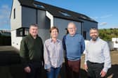Smart living and lower running costs: pictured (from left) Niall Gribbin, Director of Setanta Construction; homeowners Anne-Marie & Eddie McGoldrick; and Mark Gribbin, Director of Setanta Construction outside the McGoldrick’s full-electric, smart tech home that costs £44 per week to run, including electric vehicle charging.
