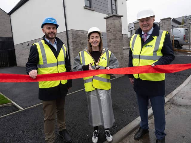 Mayor of Derry City and Strabane District Council, Cllr Grace Uí Niallais, helps officially open The Cashel housing development, alongside Ryan Boyle, Managing Director of the Braidwater Group, and Liam Hannaway, Chair of Apex Housing Association.