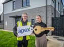 Jennifer Lindsay received the keys to her new home in Maple Glen at The Cashel recently and says it's been life-changing for her family. Pictured with Joe Doherty from Apex Housing Association.