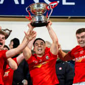 Captain Conor McCluskey of Magherafelt celebrates lifting the cup after the Derry County Senior Club Football Championship final match between Magherafelt and Newbridge at Find Insurance Celtic Park in Derry. 