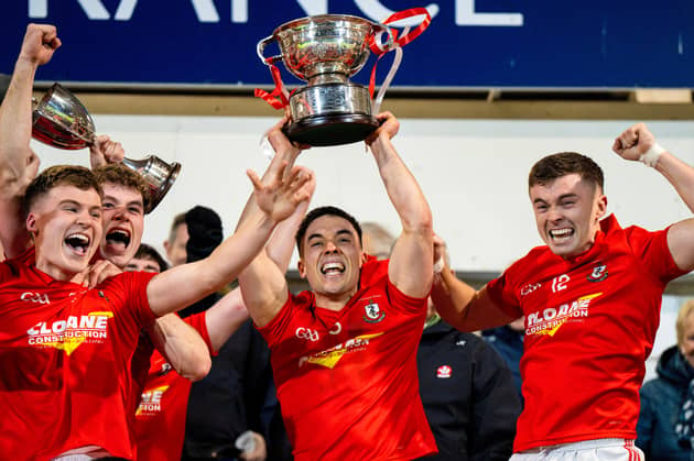 Captain Conor McCluskey of Magherafelt celebrates lifting the cup after the Derry County Senior Club Football Championship final match between Magherafelt and Newbridge at Find Insurance Celtic Park in Derry. 
