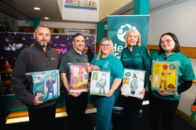 Dan Doherty and John Allen of Click Energy alongside Natasha Burke, Family Support Hub Coordinator, Mary Breslin, Deputy Director of Health for Life, and Katie Bogle, Student Social Worker.