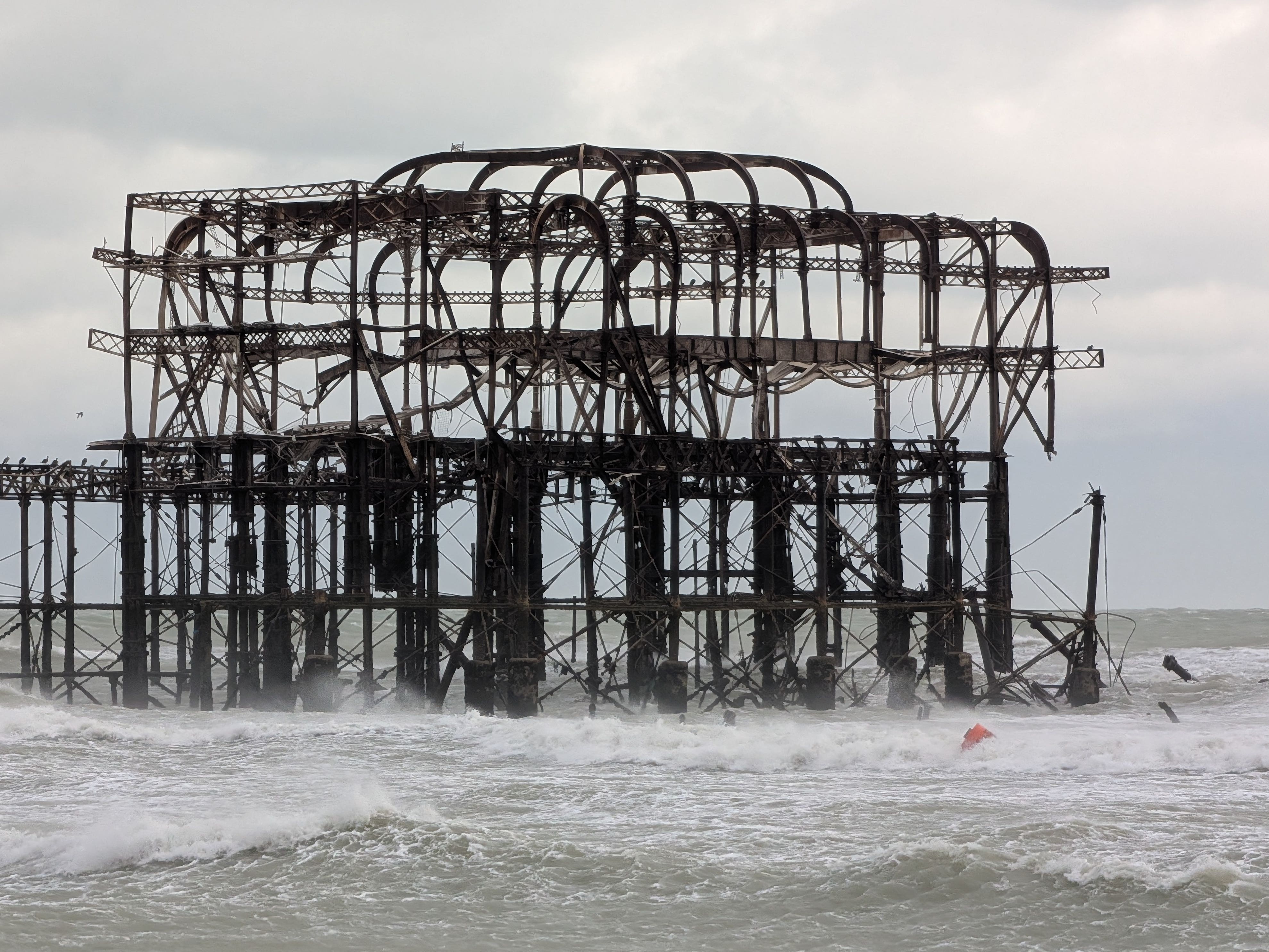 Pieces of the West Pier in Brighton falling off into the sea