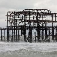 Part of historic Brighton pier collapses as storms bring heavy disruption