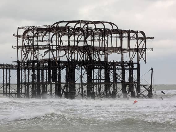 Pieces of the West Pier in Brighton falling off into the sea