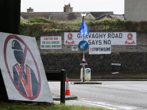 A view of signs against the parade on the Garvaghy Road