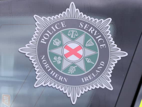 A stock picture of a Police Service of Northern Ireland (PSNI) logo badge in Belfast Northern Ireland