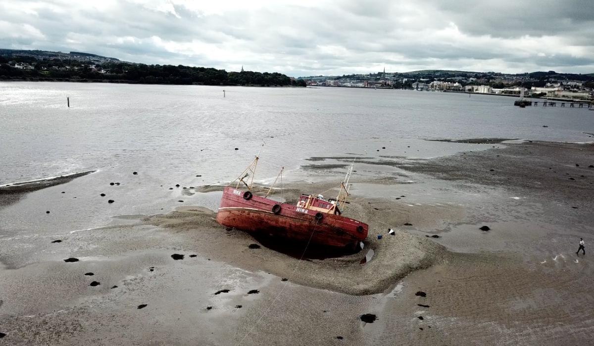 Owners of boat stuck in the River Foyle appeal for help to refloat the