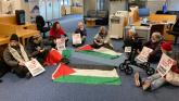 Palestine Solidarity Campaign groups occupying Derry Invest NI office.