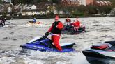 IN PICTURES: Santa ditches sleigh for jetski on Derry's River Foyle