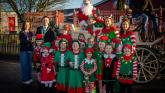 IN PICTURES: Holy Child pupils spread Christmas cheer throughout Creggan