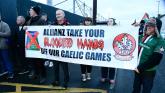 IN PICTURES: Derry and Tyrone supporters stand together in 'Drop Allianz' protest at Celtic Park