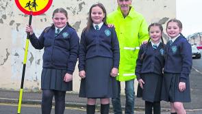 'Chatty' Derry lollipop man raises £900 for cancer charity during sponsored silence