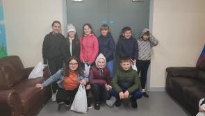 Young people deliver 'bags of happiness' to residents living in Derry estate and help lift many people's spirits