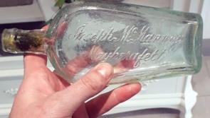 Mystery glass bottle washes up on shore