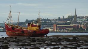 It's still there: High tide fails to refloat boat which has been stuck in the River Foyle in Derry for almost a month