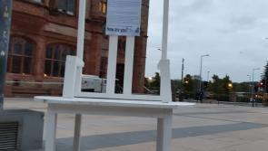 Poignant 'empty chair' placed in Derry's Guildhall Square to remember those who have died through suicide