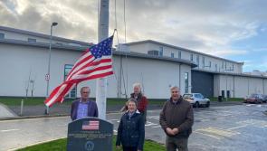 Derry school flies US flag at half mast to mark the anniversary of JFK's assassination