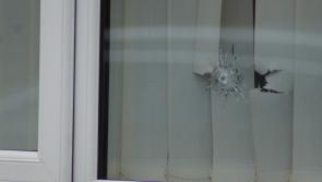 Police say up to nine shots were fired at a house in the Waterside area of Derry last night