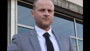 Man charged with harassing loyalist activist Jamie Bryson appears at Derry court accused of possessing weapons