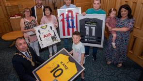 Young Derry boy who recently underwent brain surgery shows off jerseys he received from his football heroes