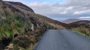 Derry motorists belng  left spellbound by 'Magic Road' where cars roll back up hill