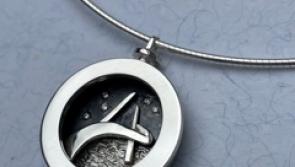 Goldsmith in Derry auctioning Peace Bridge pendant to raise funds for Foyle Hospice&nbsp;