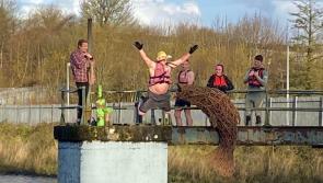 Derry volunteers brave freezing water in charity pier jump for Children in Crossfire